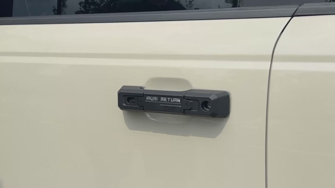 Real-life close-up showcase video demonstrating the textured matte black finish and smart keyhole compatibility of the exterior door handle covers on a Ford Bronco